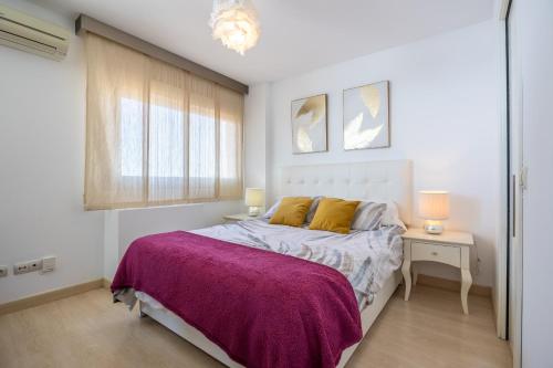 Posteľ alebo postele v izbe v ubytovaní Apartamento Perla