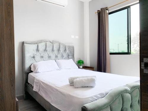 Katil atau katil-katil dalam bilik di Departamento con balcón privado