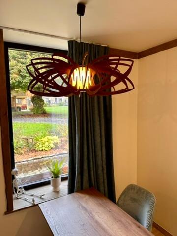 Katil atau katil-katil dalam bilik di Tiny House dans les Bois Une Évasion Cozy pour Deux !