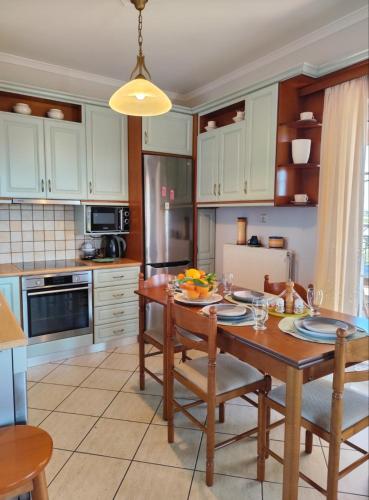 Kuchyň nebo kuchyňský kout v ubytování MyHouse
