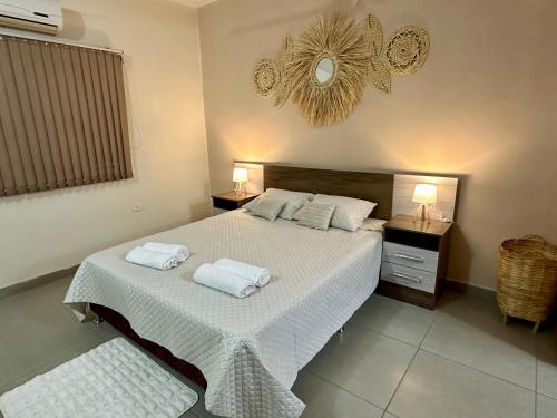 Postel nebo postele na pokoji v ubytování Apartamento con piscina, terraza y parking en las cercanías de Asunción
