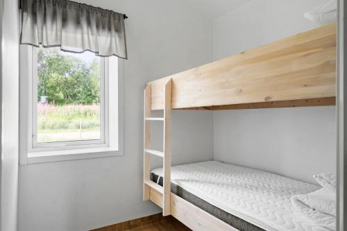 Postel nebo postele na pokoji v ubytování First Camp Fläsian - Sundsvall