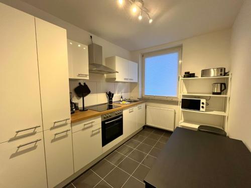 Η κουζίνα ή μικρή κουζίνα στο GuestHouse Bielefeld
