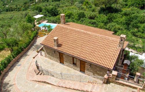 an aerial view of a house with a swimming pool at Nice Apartment In Casal Velino in Casal Velino