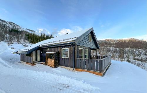 a small house in the snow in the snow at Moderne Hytte Midt I Skibakken in Ryfoss