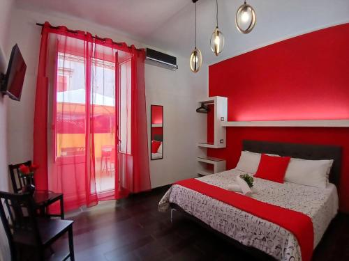 Кровать или кровати в номере B&B Scirocco D'Africa