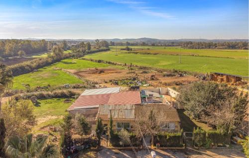 an aerial view of a house with a field at Amazing Home In La Barca De La Florida in La Barca de la Florida