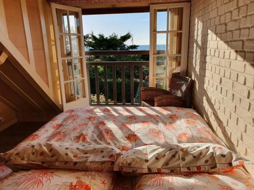 Ένα ή περισσότερα κρεβάτια σε δωμάτιο στο Villa sur la plage Deauville