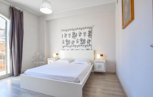 Katil atau katil-katil dalam bilik di Amazing Apartment In Trappitello