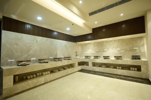 a large room with aasteryasteryasteryasteryasteryasteryasteryasteryasteryasteryastery at Coco Cabana in Varanasi