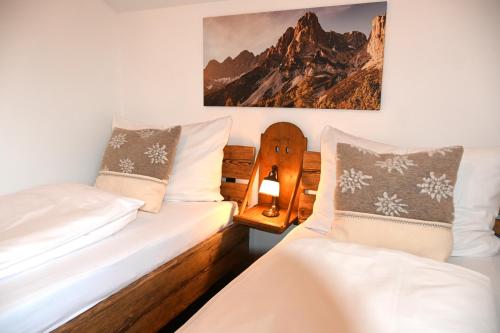 A bed or beds in a room at Haus Herz