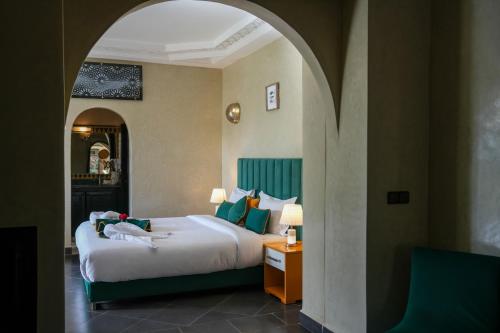 Una cama o camas en una habitación de Janat Al Atlas Resort & Spa