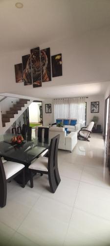 a living room with a couch and a table at Quinta Isabel in Ibagué