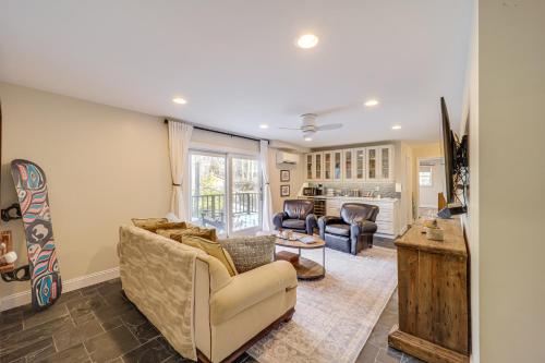 a living room with a couch and a table at 5 Mi to Dtwn Pet-Friendly Gem in Blowing Rock! in Blowing Rock