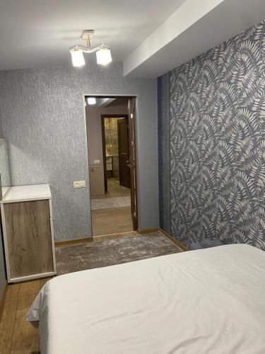 Postel nebo postele na pokoji v ubytování Apartment in Yerevan