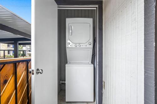 a washer and dryer sitting on top of a house at Contemporary 1BR 1Bat Pool Access in Austin