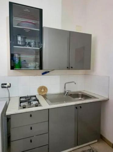 Η κουζίνα ή μικρή κουζίνα στο Bright apartment near Magliano - 50 m² with amenities