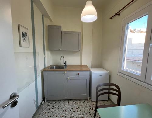Η κουζίνα ή μικρή κουζίνα στο Central -II- Apartment