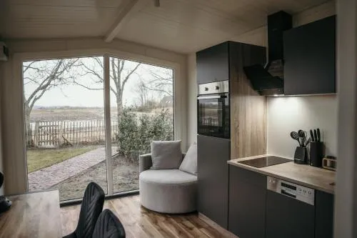 Luxe Tiny House incl Jacuzzi en Strandhuisje in zomerseizoen