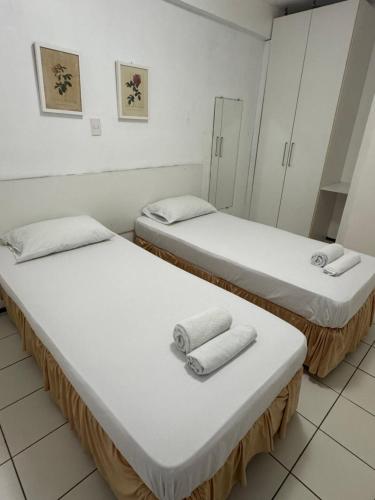 Postel nebo postele na pokoji v ubytování Flat Biarritz Ao Lado da Litorânea l Ferreira Hospedagens