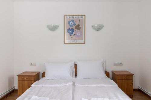 Postel nebo postele na pokoji v ubytování Robert Hotel