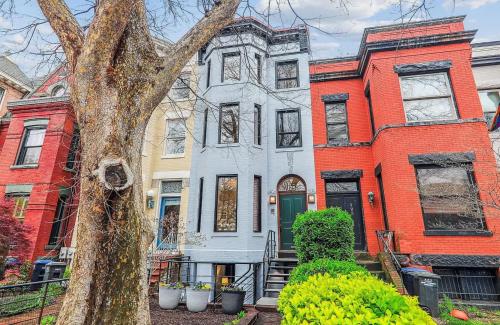 a house on a street with a tree at Historic Capitol Hill Retreat in Washington, D.C.