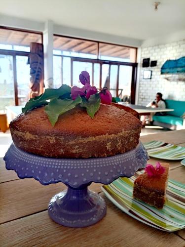 a chocolate cake on a plate on a table at Punta Vichayo - Casa Ballenas in Talara