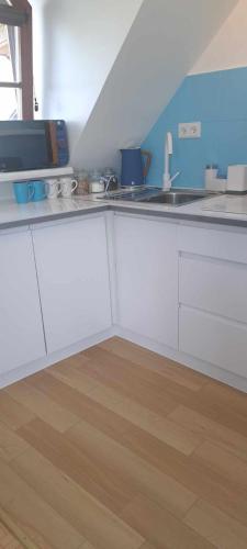 Dapur atau dapur kecil di Apartament Mikołajki SWAN