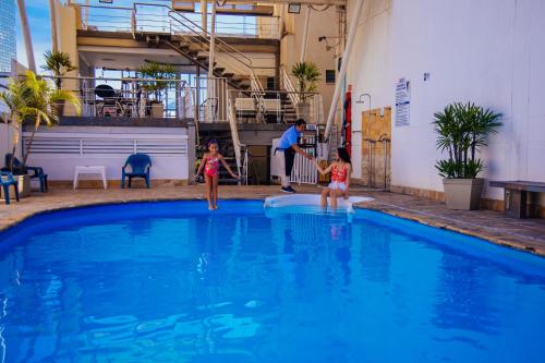 Piscina en o cerca de Hotel Plaza Las Américas Cali