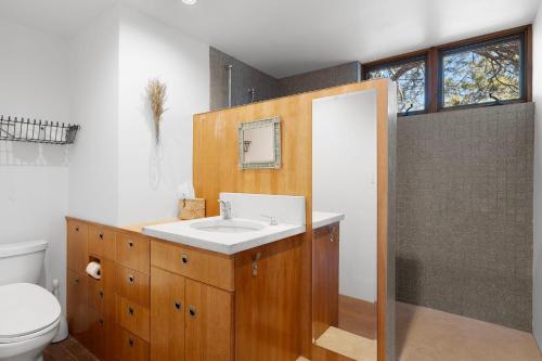 a bathroom with a sink and a toilet at Casa de Flechas in Santa Fe NM in Santa Fe