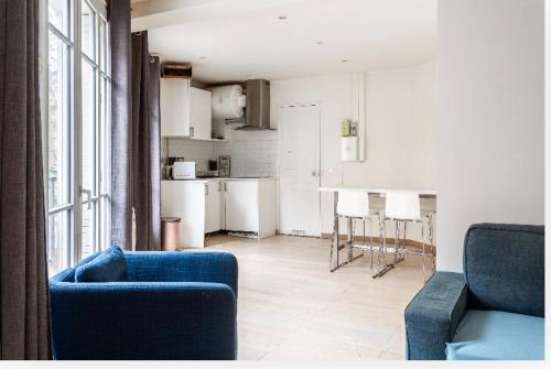 Photo de la galerie de l'établissement Appartement le bon marche, à Paris