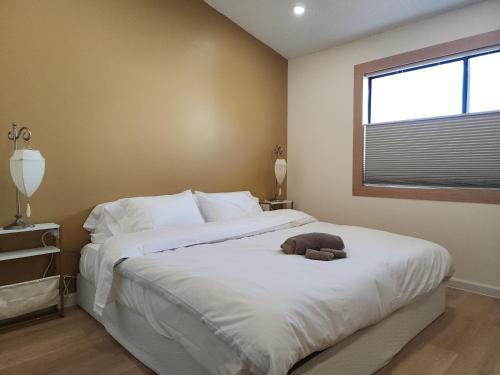 Katil atau katil-katil dalam bilik di Spacious New 3 bedrooms unit