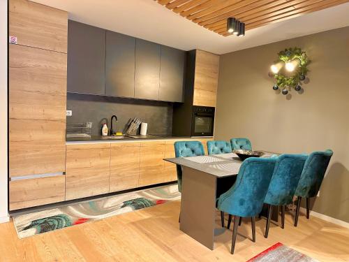 Η κουζίνα ή μικρή κουζίνα στο Apartman A402 Olimpijska kuća Jahorina