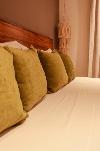 Ένα ή περισσότερα κρεβάτια σε δωμάτιο στο Modern Tulum Apt Sleeps 2