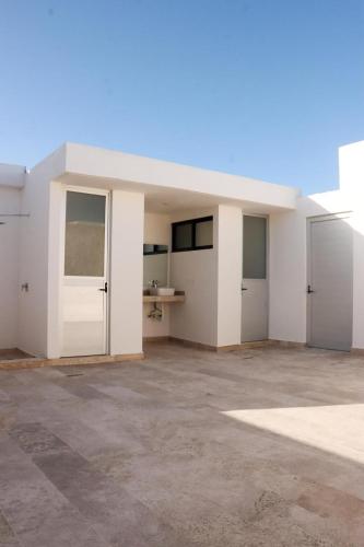 Η κουζίνα ή μικρή κουζίνα στο Modern Tulum Apt Sleeps 2