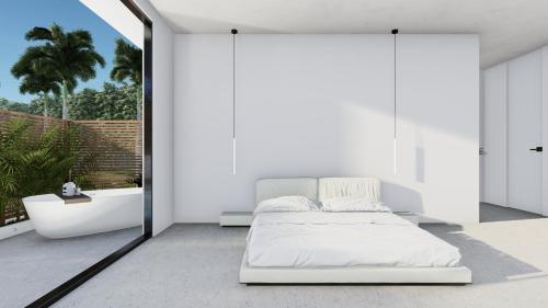 a bedroom with a bed and a bath tub at Ama Villas - Entire Estate in Montego Bay