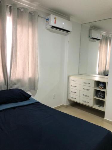 Ένα ή περισσότερα κρεβάτια σε δωμάτιο στο Apartamento em alter do chão 2 quartos
