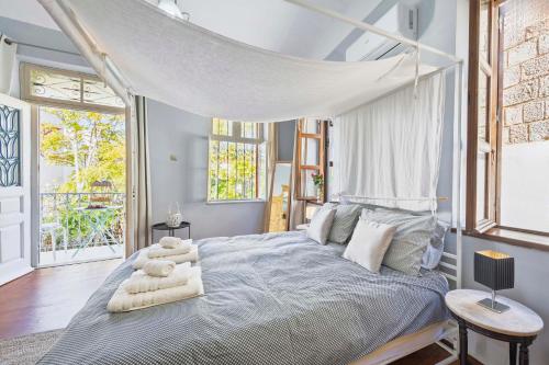 Postel nebo postele na pokoji v ubytování Maison Roxanne & Maisonette in medieval city by Rhodes4vacation