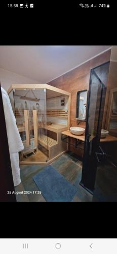 a bathroom with two sinks and a mirror at MareBob in Peršaves