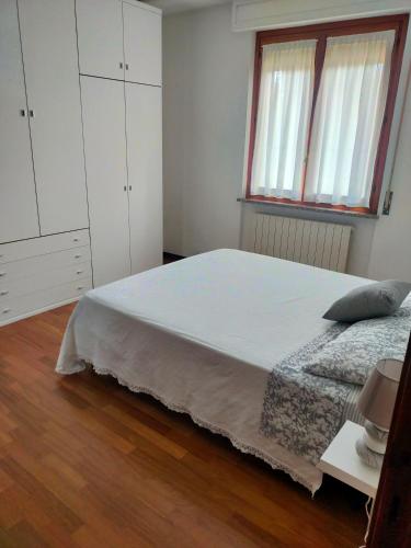 Ένα ή περισσότερα κρεβάτια σε δωμάτιο στο Casa a Villa