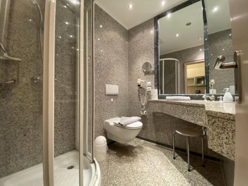 Ванная комната в Ferienwohnung Ostseeblick in der Villa Seeadler Binz