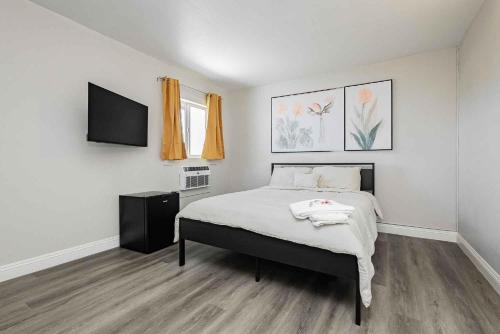 Postel nebo postele na pokoji v ubytování G Hotel
