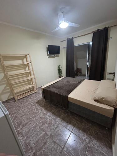 Postel nebo postele na pokoji v ubytování Suite dos anjos