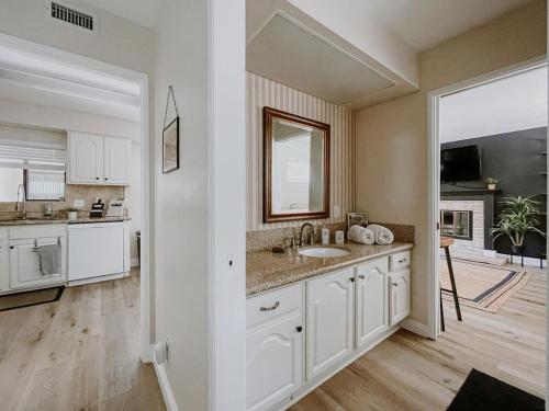 a large kitchen with a sink and a counter at San Diego Trail Guest Ranch in Poway