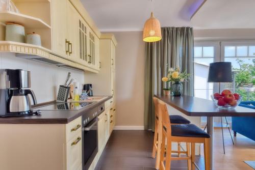 Η κουζίνα ή μικρή κουζίνα στο Ferienwohnung Hafenblick in Lauterbach