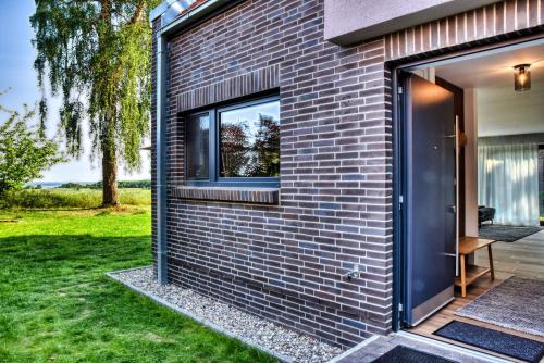 Κήπος έξω από το Ferienhaus Backsteinquartier West Putbus