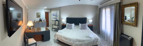 Una cama o camas en una habitación de Spilimbergo's Home