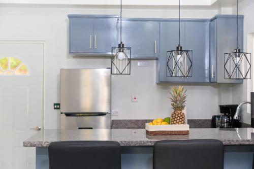 Kuchyň nebo kuchyňský kout v ubytování Caldera Villas