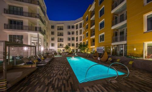 a swimming pool in the middle of a building at West Hollywood 2bdr residence in Los Angeles