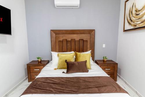 Postel nebo postele na pokoji v ubytování Exclusiva suite en el centro de Zapotlanejo 205